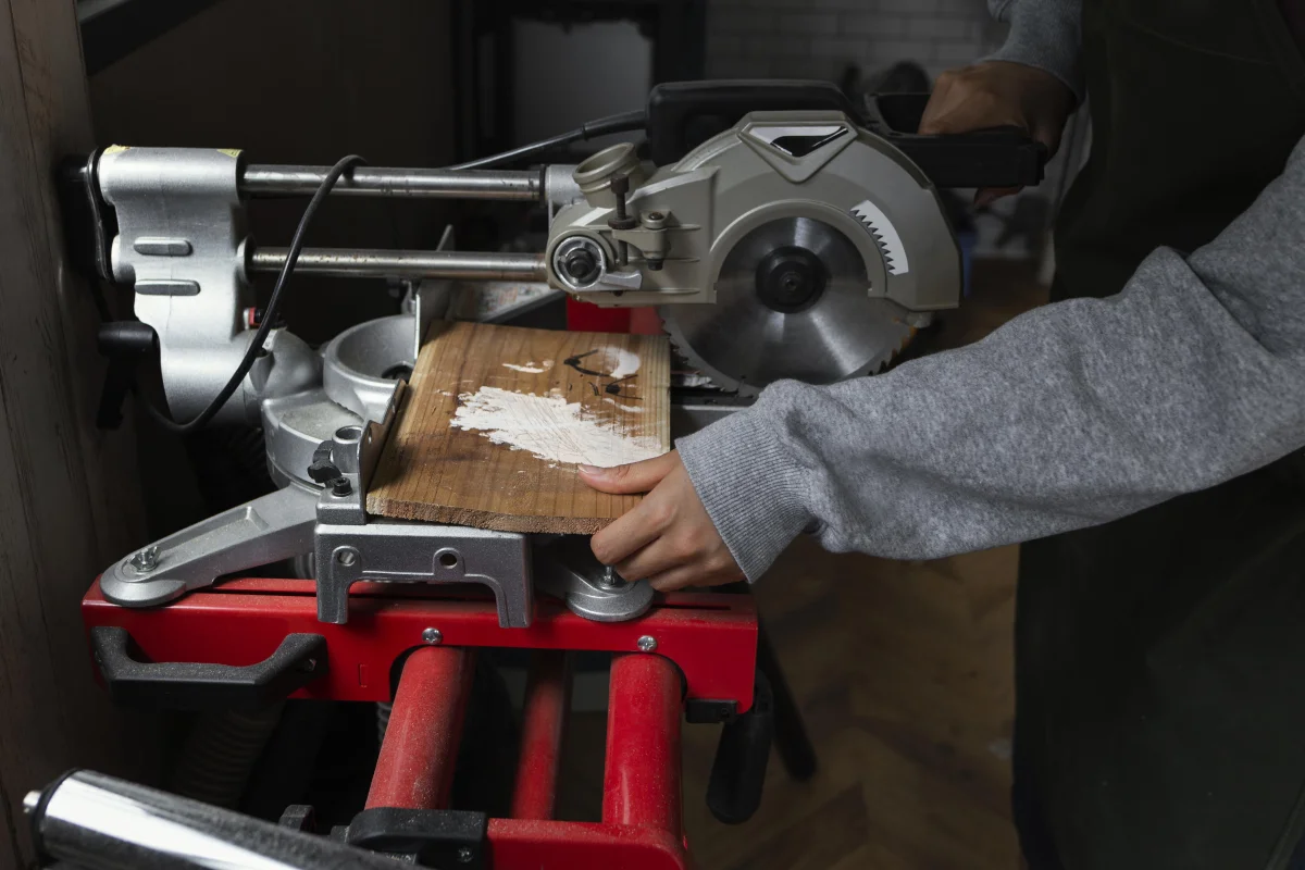 hands cutting wood